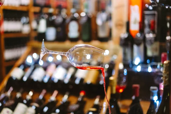 Glass of Wine Falling Mid Air with Spill — Stock Photo, Image