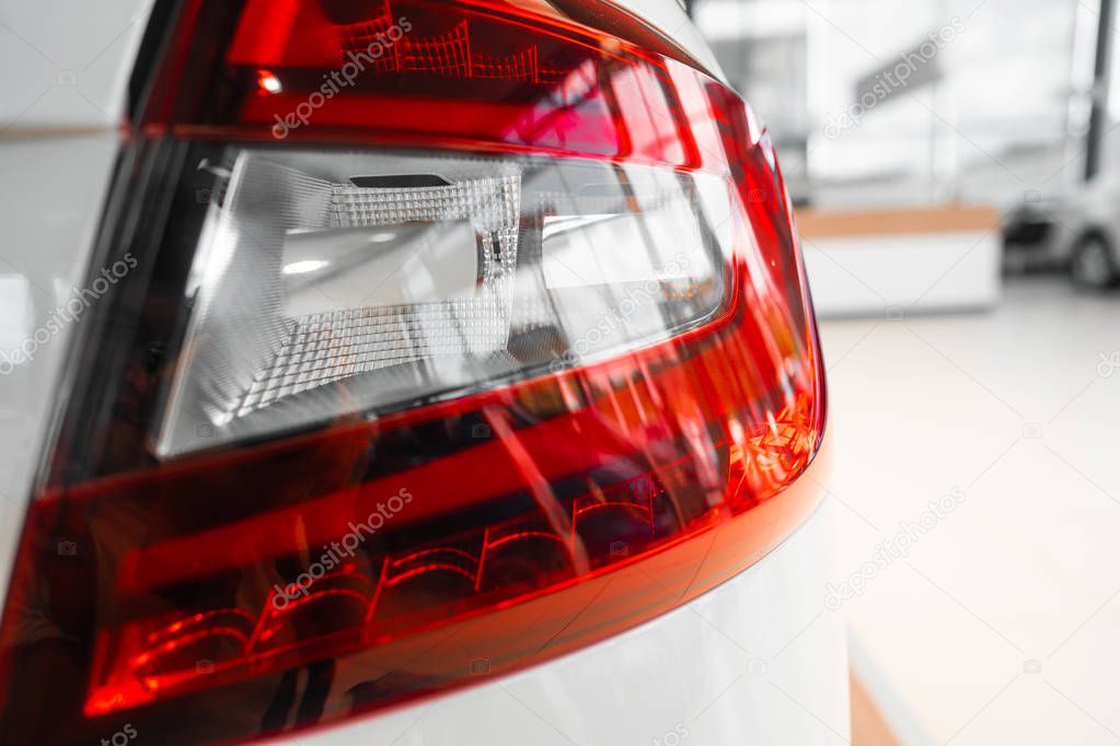 The rear lights of a modern prestigious car from a close angle