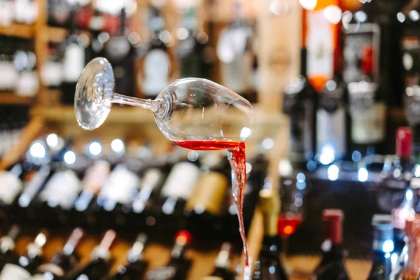 Glass of Wine Falling Mid Air with Spill — Stock Photo, Image