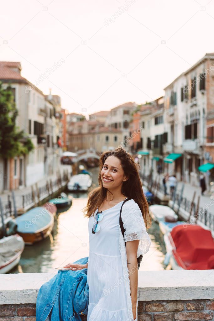 young girl walks the streets of Venice