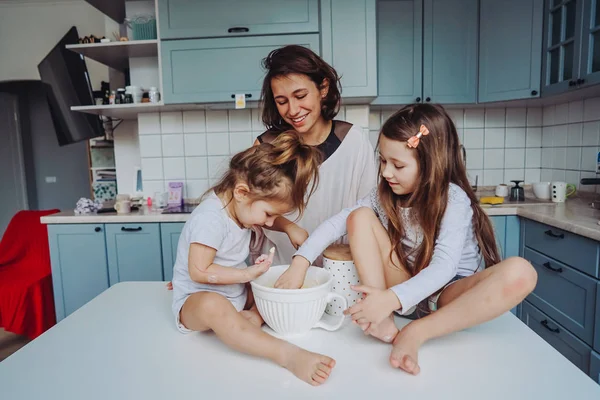 Happy family cook together in the kitchen