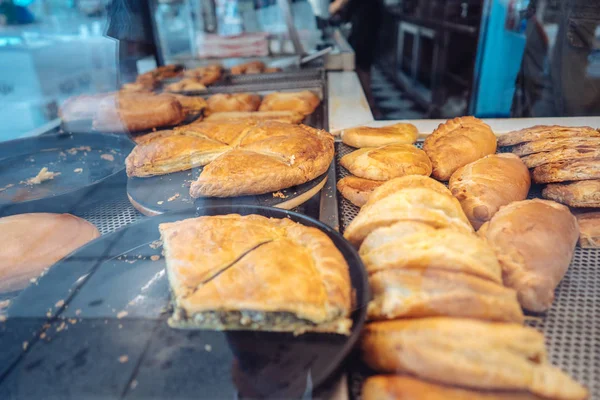 Fresh bakery in showcase of a street shop bakery food.