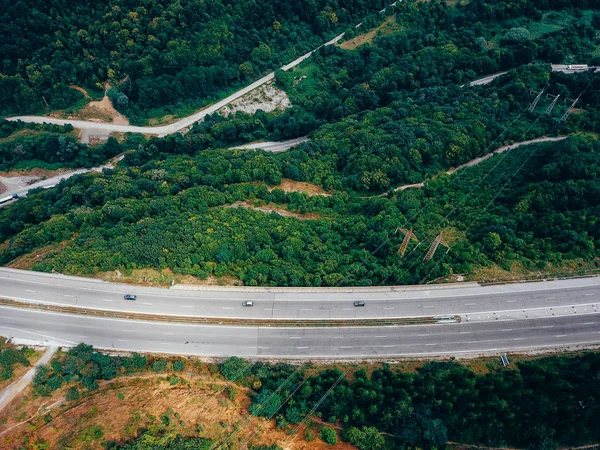 Aerial view of the road in the mountains — Stock Photo, Image