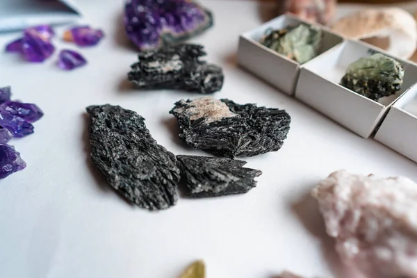 Collection of beautiful precious stones on white table. — Stock Photo, Image