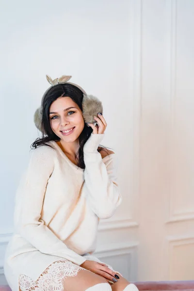 Young lady white caucasian woman in white dress posing in room — Stock Photo, Image