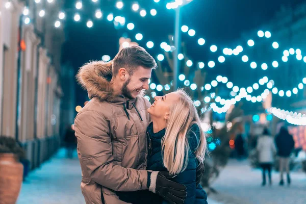 Outdoor close up portrait of young beautiful couple posing on street. — Stock Photo, Image