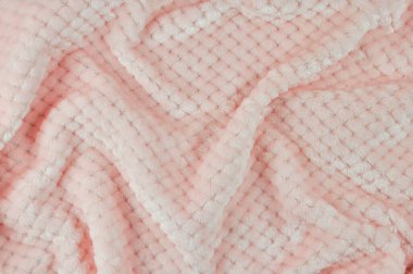 Açık pembe renkli yumuşak bebek kumaşı. Yumuşak pastel tekstil dokusu. Terry havlu. Pembe kumaş.