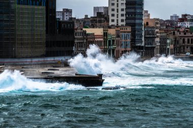 Giant waves crash over the Malecon during the storm in Havana, Cuba clipart