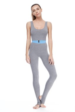 Güzel genç seksi bir kadınla mükemmel atlet vücut sağlıklı yaşam tarzı ince yoga jimnastik egzersiz germe, eğitmenler, eğitmen, fitness, spor, spor salonu uyum için sıska giyim giymek rahat spor.