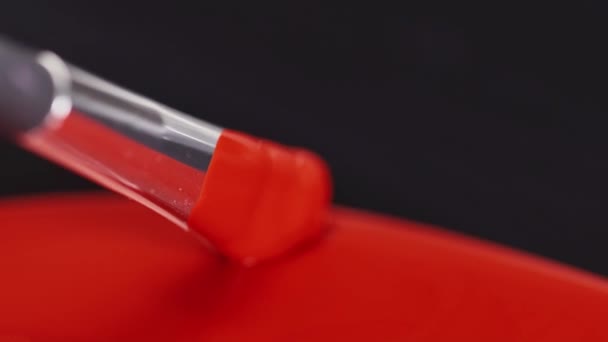 Rouge à lèvres peinture texture liquide, pinceau, peinture à l'huile pour la peinture, mélanger les nuances, art maquillage cosmétique pour le visage .