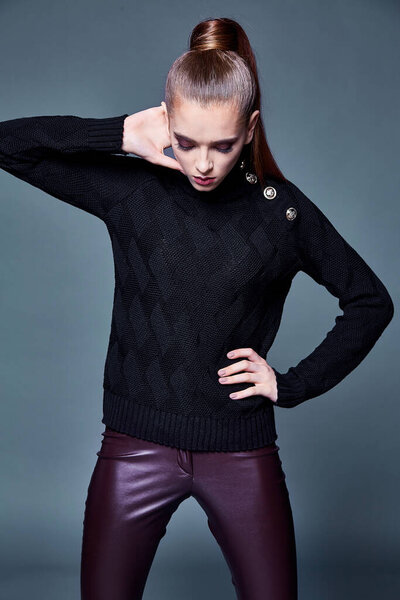 Beautiful sexy pretty woman perfect body shape face makeup wear black wool cashmere sweater and skinny lather pants sport shoes accessory casual clothes for party walk brunette hair fashion style.