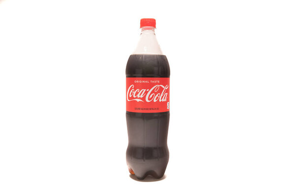April 10, 2018: Conceptual Editorial of a Liter Bottle of Coca Cola on White