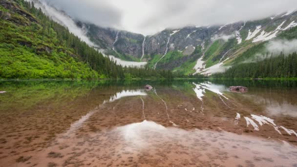 Glacier Avalanche Lake Reflects Mountain Sky — Stock Video
