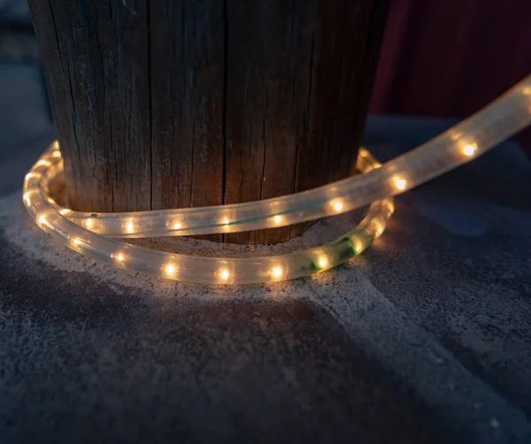 Tube Lights Wrapped Wooden Post Sidewalk — Stok Foto