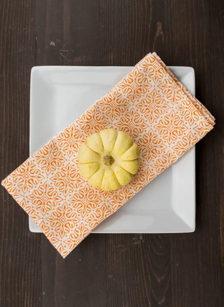 Small White Pumpkin Napkin Square Plate Wooden Table — Stock Photo, Image