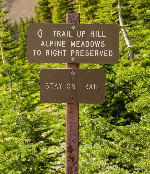 Trail Preservation Sign reminds hikers to stay off fragile meadow area