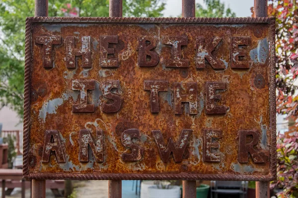 The Bike is the Answer Rusted Sign