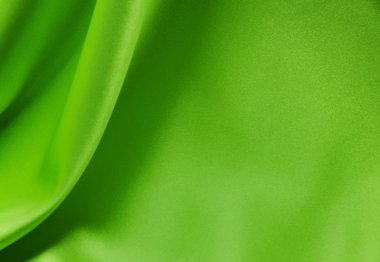 arka plan olarak yeşil saten ya da ipek kumaş