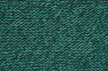 Yünlü kumaş yeşili örülmüş..