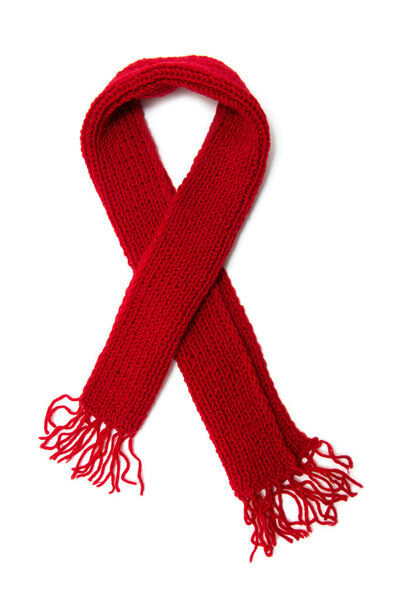 Red knitted scarf on a white background.