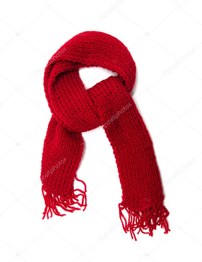 Red knitted scarf on a white background.