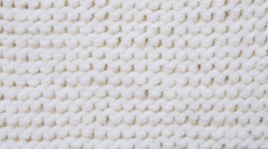 Örgü beyaz örgü giysilerin arka plan dokusu
