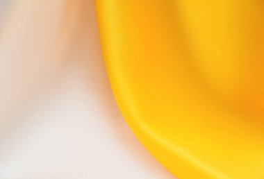 arkaplan için beyaz ve sarı saten kumaş