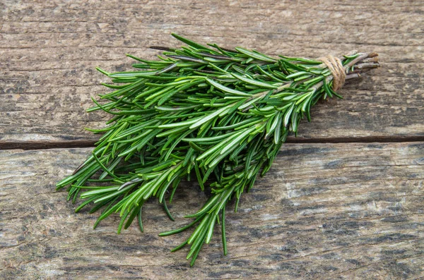 Rosemary bound on a wooden board