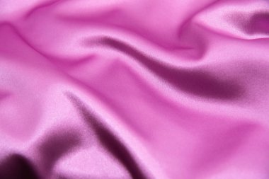 Pürüzsüz pembe ipek arka plan olarak kullanılabilir