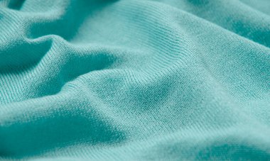 Örülmüş yün kumaş turkuazının dokusu..