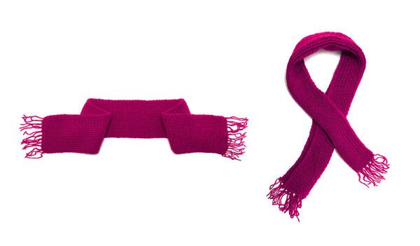 Pink knitted scarf on a white background.