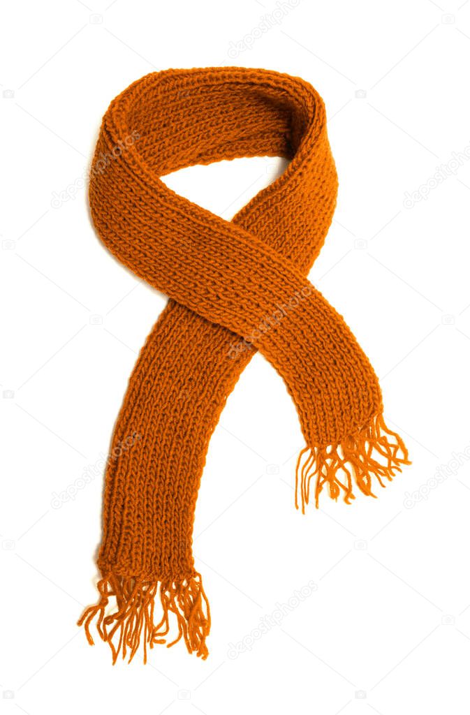 Orange knitted scarf on a white background.