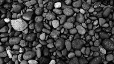 Siyah çakıl taşı sahili doğası. taş arkaplan