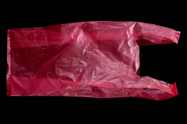 Використаний Червоний Пластиковий Мішок Чорному Тлі — стокове фото