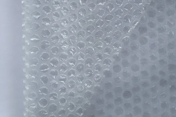 Hava kabarcığı koruma malzemelerini kapatın. Plastik warp Endüstriyel Paketleme