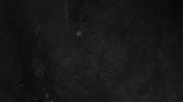 Siyah beton duvar arka planı. Arkaplan için soyut somut doku