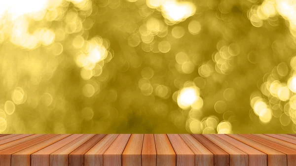 木桌顶部的Bokeh轻抽象背景可用于蒙太奇或显示您的产品 — 图库照片