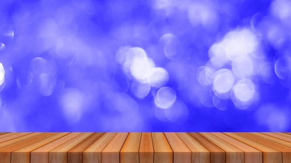 Wood table top on bokeh light background can be used for montage or display your products