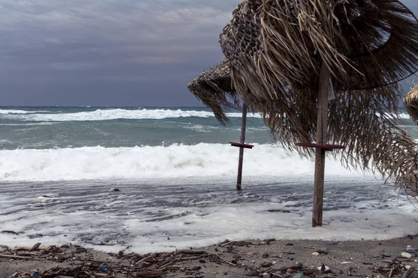 Storm Beach Destroying Parasols — Stock Photo, Image