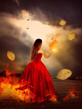 Young woman in beautiful red dress with fire and dramatic sky clipart