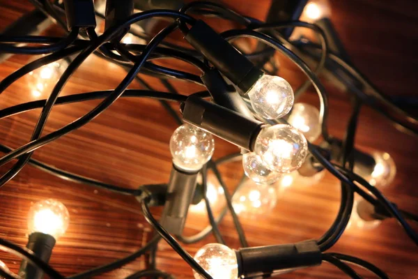 Noel ışıkları ahşap arka plan üzerinde detay