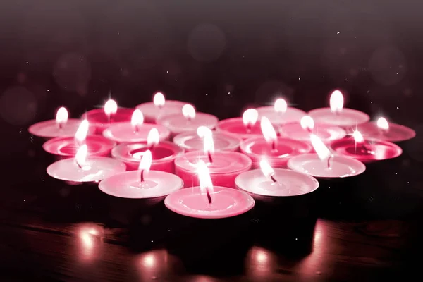 Background with heart of candles — Stock Photo, Image