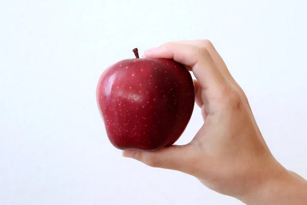 Foto Manzana Roja Mano Con Fondo Blanco —  Fotos de Stock