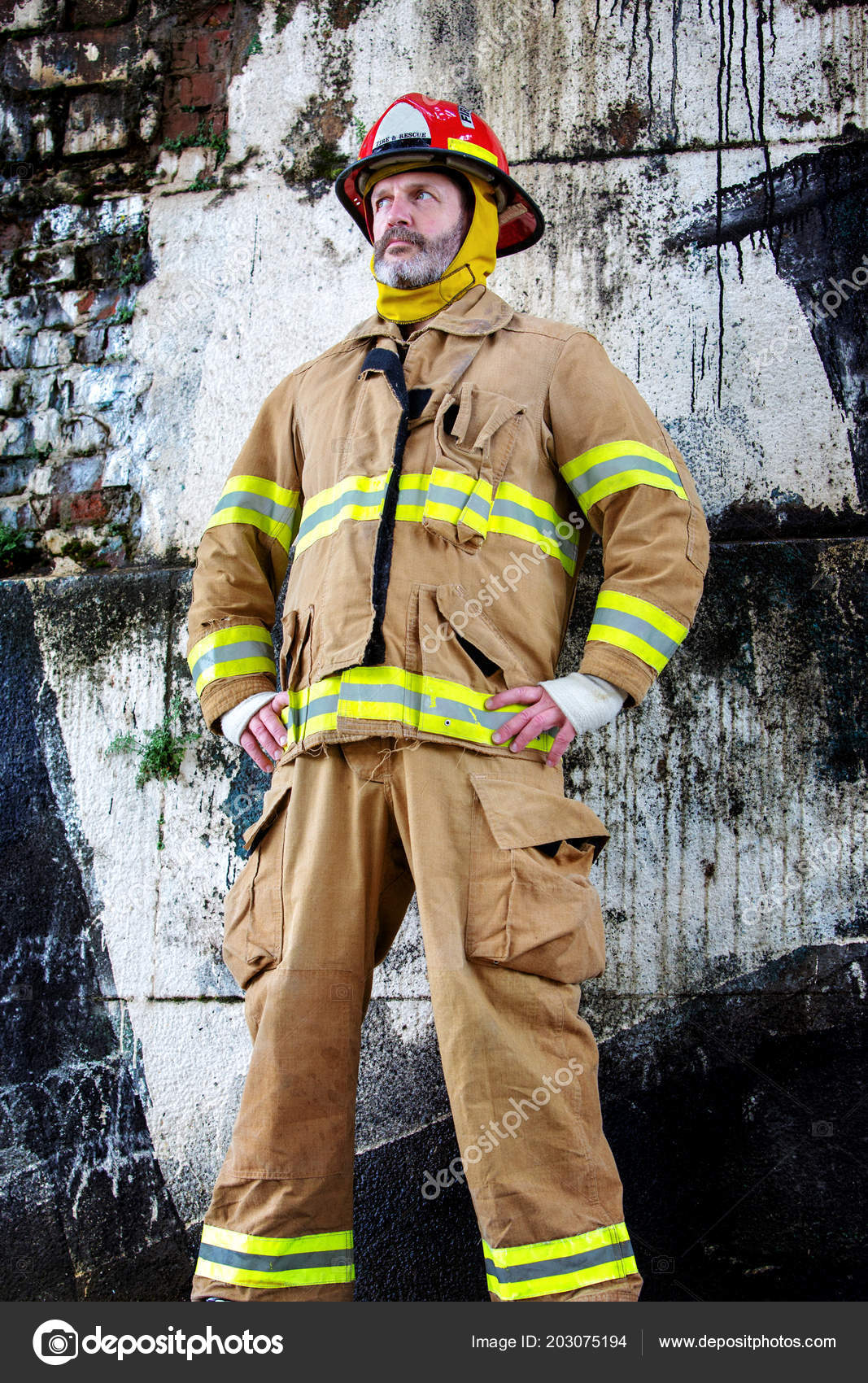 Portrait Handsome Fireman Uniform Standing Front Wall Stock Photo by  ©wernerimages 203075194