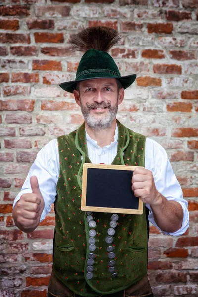 Handsome Bavarian Man Holding Black Board Thumbs — Stock Photo, Image