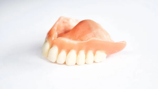 Closeup Dental Prosthesis White Background — Stock Photo, Image