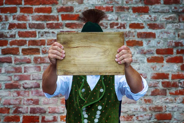 Bavarian Man Outdoors Holding Wooden Plank Front His Head — Stock Photo, Image