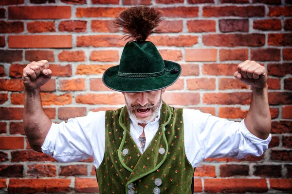 Handsome Bavarian Man Flexing His Muscles Front Brick Wall — Stock Photo, Image