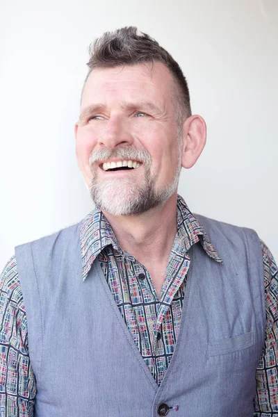 Smiling handsome grey-haired man in his 50s — Stock Photo, Image