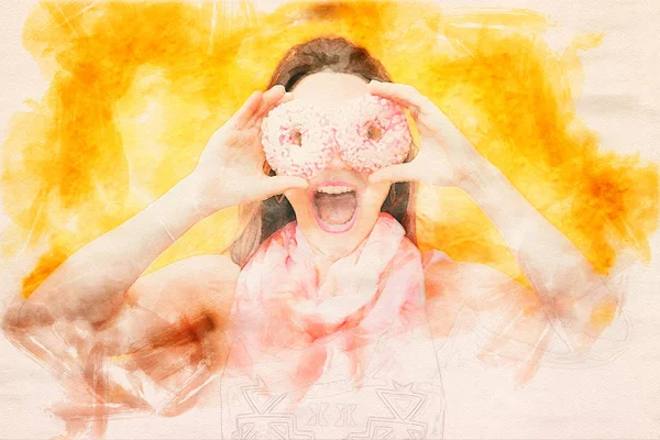 Jeune femme tenant deux beignets à ses yeux — Photo